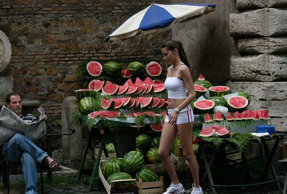 adriana lima, model, brunette, sporty, watermelons, newspaper, old amn, old man, hot chick, watermelon