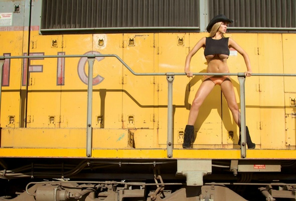 jordan carver, train, hat, boots, half shirt, boobs, outdoors, underboobs, too big for her top, underboob