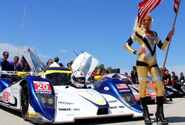blonde, pit girl, slim, amateur, tight clothes, posing, outdoor, sexy, dressed, racecar, car race, sexy babe, long hair, shiny, golden, lycra, catsuit, cameltoe, legs, leather, ankle boots, flag, shiny clothes, fetish babe, babes and cars