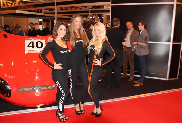 3 babes, group, babes and cars, amateur, slim, brunette, blonde, sexy babe, long hair, posing, smile, tight clothes, lycra, catsuit, sexy, decollete, cameltoe, legs, high heels, racecar, convention, erotic, fetish babe