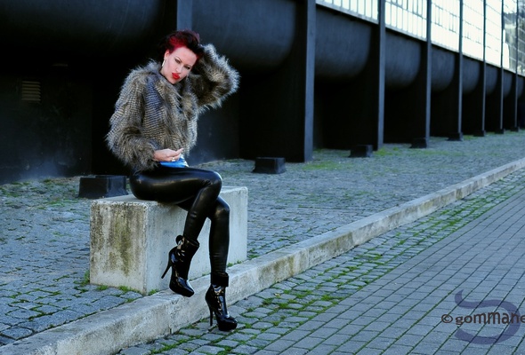 dolly d, redhead, busty, milf, alternative, amateur, model, sexy babe, long hair, posing, outdoor, erotic, red lips, sexy, dressed, tight clothes, fur jacket, black, latex, leggings, pvc, ankle boots, fetish babe, gommanegra photo, babes in boots