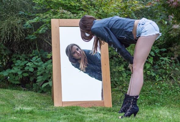 brunette, sexy girl, beautiful female legs, jeans shorts, boots, mirror, reflection, long hair, young, sexy babe, bend forward, sexy, dressed, casual wear, leather jacket, pantyhose, ankle boots, erotic, reflection, face