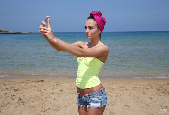 sapphira, brunette, sexy girl, adult model, t-shirt, jeans shorts, sea, water, beach, sand, selfie, maya m, sapphira a, evinka purgatova, jeans, denim shorts, non nude