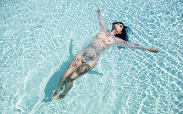 brunette, smooth pussy, shaved, tattoos, piercing, lying, pool, riae, riae suicide, suicide girls, floating, see through, pierced nipples, dark hair, nose ring