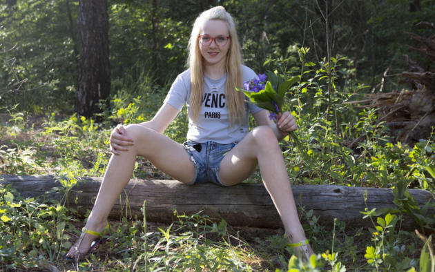 nika, blonde, glasses, jean shorts, forest, nerdy, outdoors, pale skin, non nude, jeans shorts, smile
