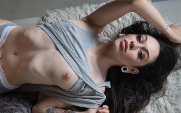 suicide girls, undressing, panties, boobs, brunette, laying, pierced nipples, nipples, tits