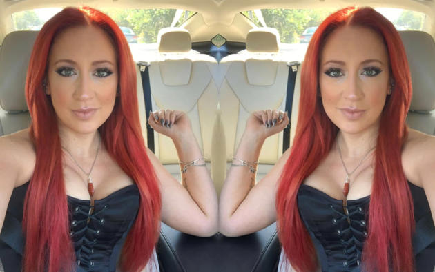 babe, sexy, red hair, cleavage, corset, car, smile, tattoo, jewelry
