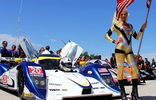blonde, pit girl, slim, amateur, tight clothes, posing, outdoor, sexy, dressed, racecar, car race, sexy babe, long hair, shiny, golden, lycra, catsuit, cameltoe, legs, leather, ankle boots, flag, shiny clothes, fetish babe, babes and cars