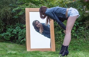 brunette, sexy girl, beautiful female legs, jeans shorts, boots, mirror, reflection, long hair, young, sexy babe, bend forward, sexy, dressed, casual wear, leather jacket, pantyhose, ankle boots, erotic, reflection, face