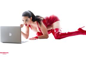 amy anderssen, brunette, adult model, exotic, pornstar, busty, sexy babe, long hair, latina, pornactress, posing, kneeling, tight clothes, latex, minidress, decollete, pvc, overknee boots, fetish babe, erotic, minimalist wall, shiny, rubber, fetish, laptop
