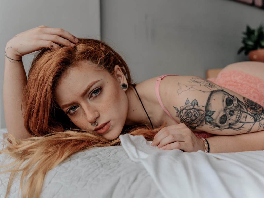 adriana, redhead, non nude, eye contact, tattoo, panties, lingerie