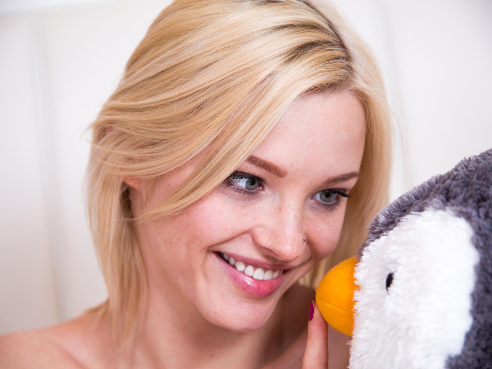 zazie, lovely, blonde, stuffed penguin, blue eyes, face, smile