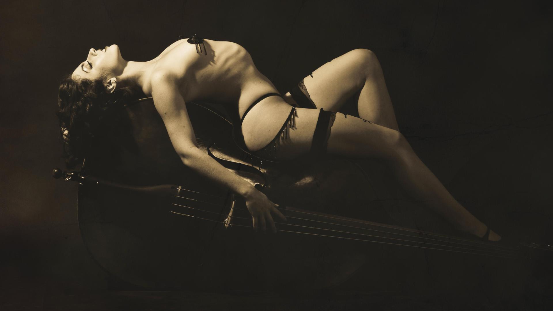 brunette, model, sexy babe, curly hair, posing, laying, contrabass, erotic art, pin up style, lingerie, stockings, black and white, ribs, pasties
